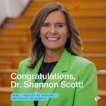 Dr. Shannon Scott stands in front of set of wooden stairs. Text over image reads: "Congratulation, Dr. Shannon Scott! Dean - Faculty of Nursing - University of Alberta"