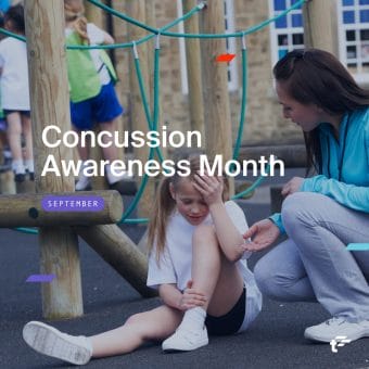 Child holds head next to playground equipment as adult next to them holds out their hand. Text reads: "Concussion Awareness Month. September."