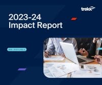 An image of two people working on a laptop at a messy desk is displayed over a navy background. Text reads: "2023-24 Impact Report"